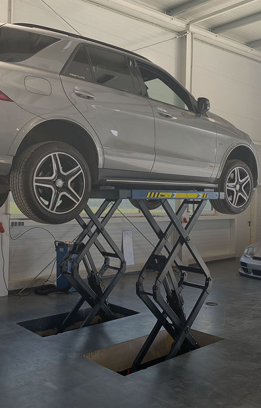 xx63-kroemer-scherenhebebuehne-mobile-garage-pkw